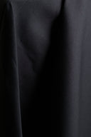 Coin plié du tissu coton déperlant anthracite, mettant en valeur la tenue nette du tissu.