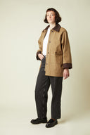 Barn Jacket pattern – 3/4 front view, camel jacket burgundy velvet collar, white t-shirt, charcoal grey jeans – Atelier Brunette
