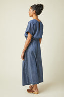 Trouser Dress pattern (envelope) – left profile view, blue chambray, 7/8 length – Atelier Brunette
